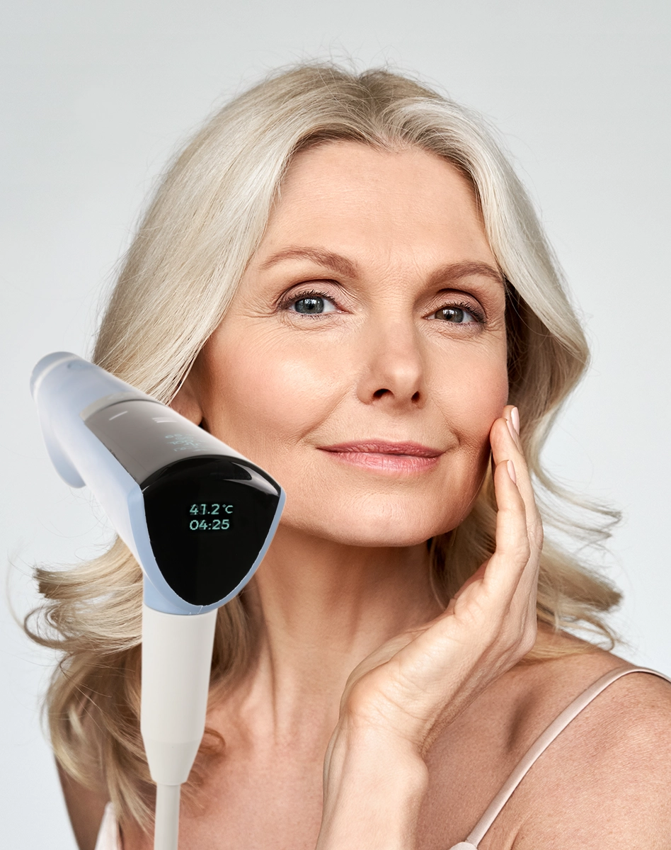 Exion Face Device with older woman with revatalized skin